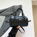 Black quilted leather boston bag with heart stitching and silver bow detail - Black