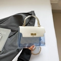 Bolso bandolera con solapa de cuero marfil y cuerpo de PVC azul transparente acolchado - Blanco