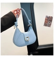 Detail of light blue baguette bag with gold D-ring buckle and knotted strap handle - Blue