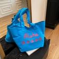 Bright blue canvas tote bag with pink artistic lettering and large capacity design - Blue