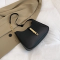 Minimalist black leather hobo bag with golden metal push-lock and chain strap detail - Black
