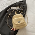 Quilted cream yellow mini backpack with silver twist lock and woven chain straps - Yellow