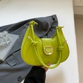 Fluorescent green semi-circle shoulder bag with golden D-clasp and knotted strap detail - Green