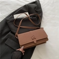 Brown rectangular crossbody bag with textured finish and adjustable shoulder strap - Brown