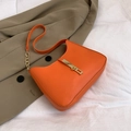 Chic orange crescent underarm bag with gold metal buckle and stylish chain strap - Orange