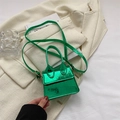 Mini metallic green crossbody bag with crocodile embossing and curved handle - Green