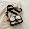 White leather square crossbody bag with red cherry print and black wide shoulder strap - With Pendant / Black