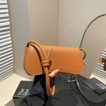 Caramel lychee grain leather shoulder bag with gold logo and knotted strap detail - Brown