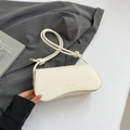 Minimalist cream white crossbody bag with lychee grain leather and woven knot strap - White