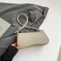 Minimalist beige pebble leather crossbody bag with knot handle and gold hardware - Khaki