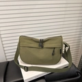Minimalist army green nylon tote bag with adjustable black strap and dual zippers - Green