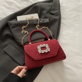 Elegant red suede crossbody bag with sparkling crystal buckle and gold chain strap - Red