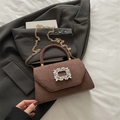 Elegant dark brown suede crossbody bag with sparkling rhinestone buckle and gold chain - Brown