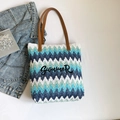 Blue and white wave pattern straw tote bag with Summer embroidery and brown handles - Blue