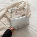 Silver metallic leather cosmetic bag with chic chain strap and minimalist design - Silver
