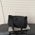 Large black nylon canvas crossbody bag with wide strap in a stylish minimalist design - Black