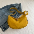 Minimalist bright yellow half-moon crossbody bag with matching mini round pouch - Yellow