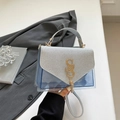 Borsa a tracolla in PVC blu trasparente con patta di paillettes argento e logo SS - Argento