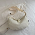 Borsa a tracolla a mezzaluna beige crema con tracolla regolabile e dettagli con nodi - Bianco