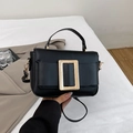 Classic black square handbag with golden metal buckle and adjustable shoulder strap - Black