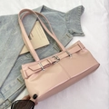 Pink baguette shoulder bag in faux leather with silver buckle and belt detail - Pink