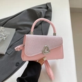 Pink glitter handbag with silver heart buckle and adjustable shoulder strap - Pink