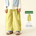 Kids wide-leg cargo pants in yellow-green with elastic waist and large side pockets - 130cm / Bottoms / Yellow-Green