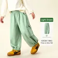 Kids light green jogger pants with cargo pockets and elasticated cuffs in soft fabric - 90cm / Bottoms / Grass Green