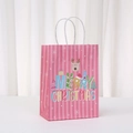 Roze kerstcadeautas van kraftpapier met rendierprint en witte touwhandvatten - Roze Gestreepte Rendier Stijl (565-6)