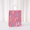Pink Christmas paper gift bag with colorful tree prints and white twisted rope handles - Pink Christmas Trees Grove Style (565-1)