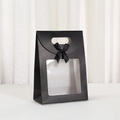 Elegant black paper gift bag with square clear window and a silk ribbon bow handle - Black
