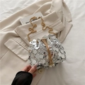 Silver sequin bucket bag featuring a gold chain strap and elegant pearl drawstring accents - Silver