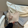 Creamy white PU leather bucket bag with plush bear charm and woven rope handle - White With Pendant