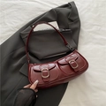Minimalist burgundy shoulder bag in glossy PU leather with vintage buckle pockets - Red