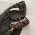 Deep brown minimalist baguette shoulder bag with twin front pockets and silver buckles - Brown