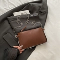 Brown crocodile embossed shoulder bag with silver chain strap and metal rivet details - Brown