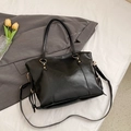 Glossy black large tote bag with gold hardware and removable shoulder strap for daily commuting - Black