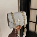 Silver glitter chain shoulder bag with gold SSS logo and tassel for party wear - Silver