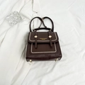 Dark brown matte leather versatile women's backpack with gold hardware and flap closure - Brown