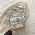 Chic blue and cream contrast underarm bag with metal M logo and slim strap - Pale Blue