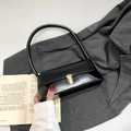 Minimalist black glossy leather shoulder bag with elegant gold square buckle and strap - Black
