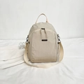 Zaino versatile in nylon beige chiaro con spallacci regolabili e tasche con zip - Bianco