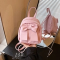 Piccolo zaino rosa da donna con fiocco in nylon morbido e spalline regolabili - Rosa
