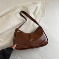 Chic brown patent leather hobo bag with adjustable shoulder strap in minimalist style - Brown