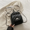 Mini black quilted backpack with rhinestones and silver chain strap for women - Black