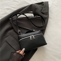 Classic black pebbled leather crossbody bag with silver zippers and top handle - Black