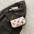 Chic strawberry print crossbody bag in off-white PU leather with black strap and gold chain - Black