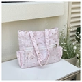 Dettaglio borsa shopper a scacchi rosa con stampa a stelle e doppie tasche a zip - Rosa