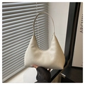 Detail of off-white faux leather shoulder bag with textured snake skin embossing - White