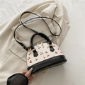 Chic cream shell bag with cherry print and black leather accents for women - Black